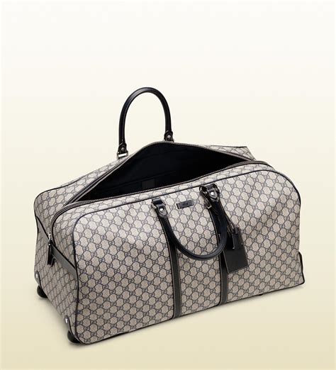 mens gucci luggage|gucci duffle bag with wheels.